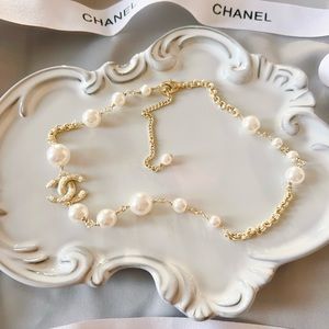 Authentic Chanel charm pearl necklace